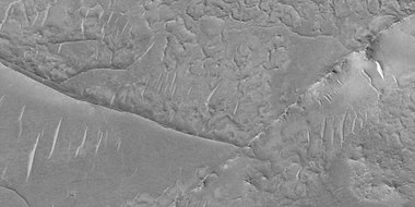 Close view of ridge networks, as seen by HiRISE under HiWish program. Ridges of different sizes are visible in this image.