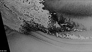 Defrosting going on in Playfair crater, as seen by CTX camera (on Mars Reconnaissance Orbiter). Dark areas are where frost has disappeared thereby showing dark ground. Note: this is an enlargement of the previous image of Playfair crater.