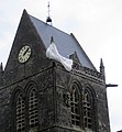 Monument to John Steele who was caught on the church spire during D-Day