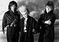 Bailey (right) as member of the Thompson Twins, 1985