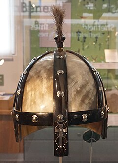 A reconstruction of the Benty Grange helm on display beside the historical find.